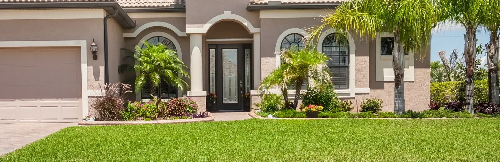 house with a well maintained yard